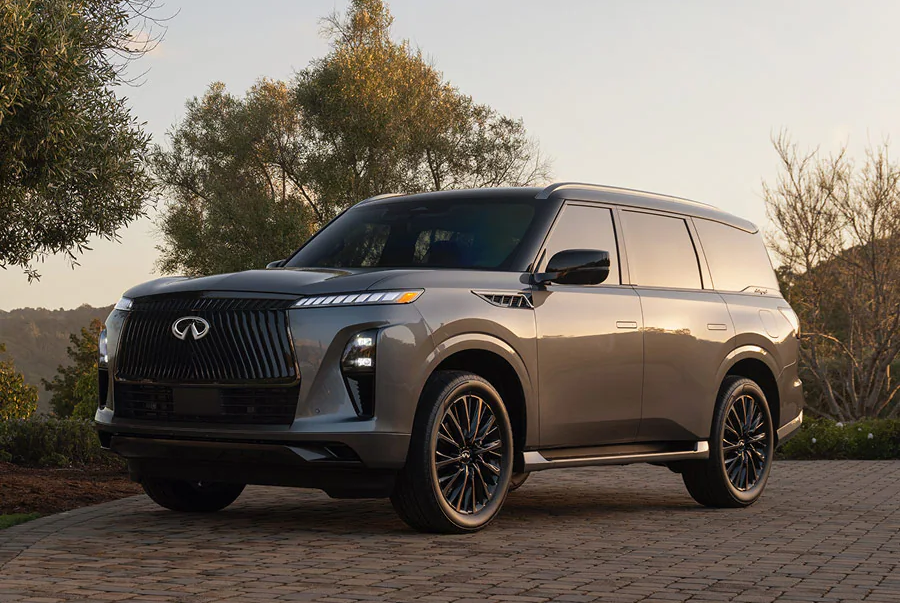 A 2026 INFINITI QX80 parked on cobblestone in Rogers, AR 